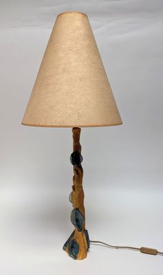 an image of a lamp with a wooden base and a lamp shade