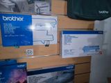 a box of brother printer paper on the wall