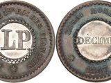 un gros plan d'une pièce de monnaie sur laquelle figure l'inscription « l p »
