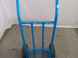 an image of a hand truck with a blue handle