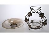 a bowl and a candle holder on the table