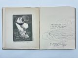 un livre ouvert sur lequel est dessiné un oiseau