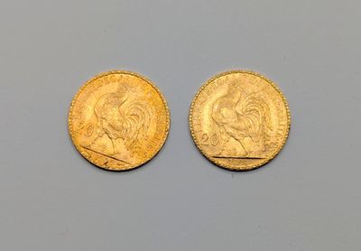 deux souverains d'or, dont l'un porte le portrait d'un homme et l'autre celui d'une femme