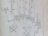 an old book with a drawing of a hand on it