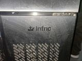 an image of a metal refrigerator with the word infinit written on it