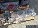 a pile of tools sitting on top of a wooden pallet