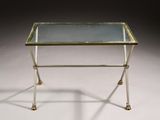 a brass and glass side table with a glass top