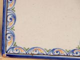 a picture of a blue and white plate on a table