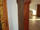 a grandfather clock in the corner of a room