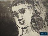 an image of a drawing of a woman ' s face on a piece of paper