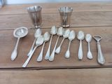 a lot of spoons that are sitting on a table