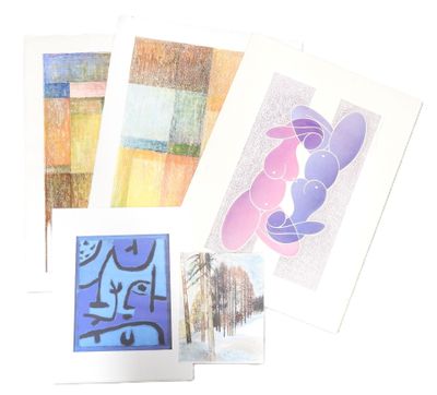 four cards with different designs on them on a white surface