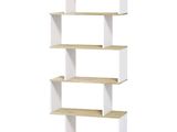 a close up of a white book shelf with four shelves