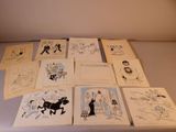 beaucoup de dessins de bandes dessinées sur la table