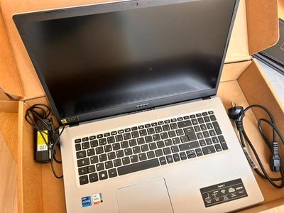 a laptop that is sitting in a box on the floor