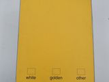 a box of yellow mail sitting on top of a white table