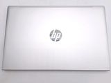 a laptop that is sitting on a white table