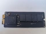 a close up of a memory chip on top of a hard drive