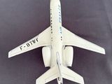 a model of an airplane that is on a table
