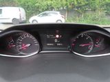 a picture of a dashboard of a car with a few gauges
