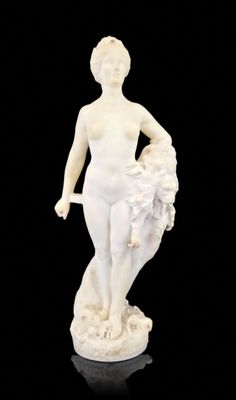 an image of a statue of a woman holding a basket of flowers