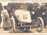 an old photo of a race car with a number on it