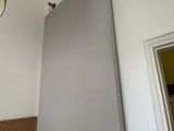 a picture of a picture of a room with a light hanging from the ceiling