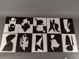 six different black and white abstract paintings on a wall