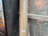a picture of a roll of plastic wrapped around a stove
