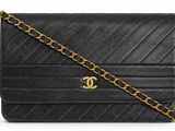 a chanel black quilted leather shoulder bag with gold chain