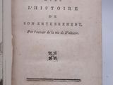 an open book with a picture of a man and a woman on it