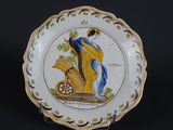 an image of a decorative plate with a woman on it