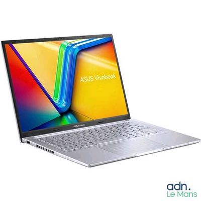 the asus vivobook laptop is open and ready to be used