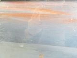 a man riding a skateboard on a skateboard ramp