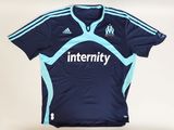 a close up of a soccer jersey on a white background