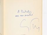 un livre ouvert, avec un titre écrit à la main et l'image d'un éléphant
