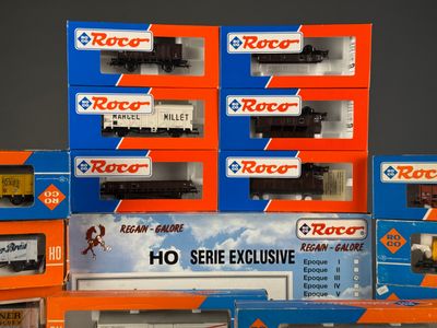 a lot of toy trains that are stacked on top of each other