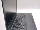 a laptop computer that is sitting on a table