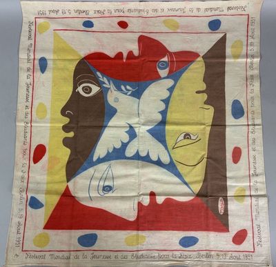an old handkerchief with a picture of a woman and a bird