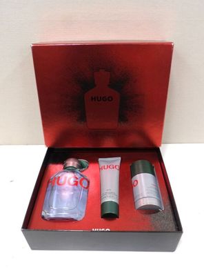 une image représentant une boîte rouge contenant un flacon de parfum et un tube de lotion