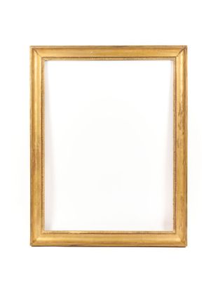 an empty wooden frame on a white wall