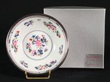 a white plate with a floral design on it