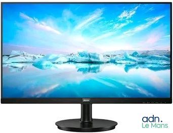 a computer monitor sitting on top of a desk next to an iceberg