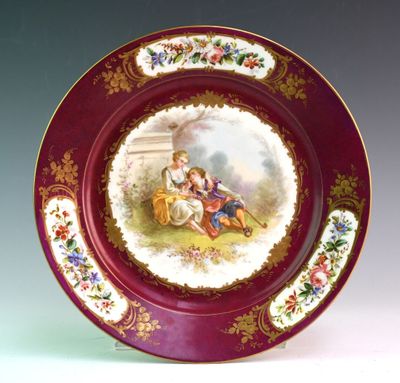 a plate with a picture of two children on it
