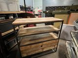 a table that is made out of wood and metal