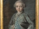 portrait of a young boy in a blue dress with a black book