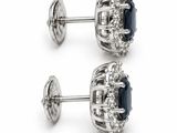 pair of sapphire and diamond stud earrings on a white background