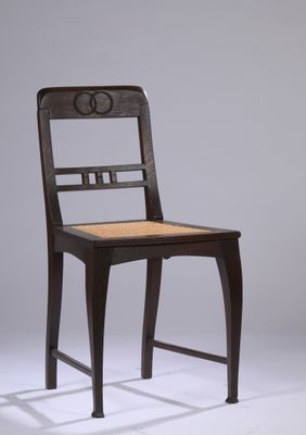 an image of a wooden chair with a seat made of wood and a seat made of wood