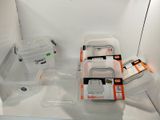 many plastic containers that are sitting on a shelf