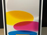 a box with a picture of a colorful apple ipad 12